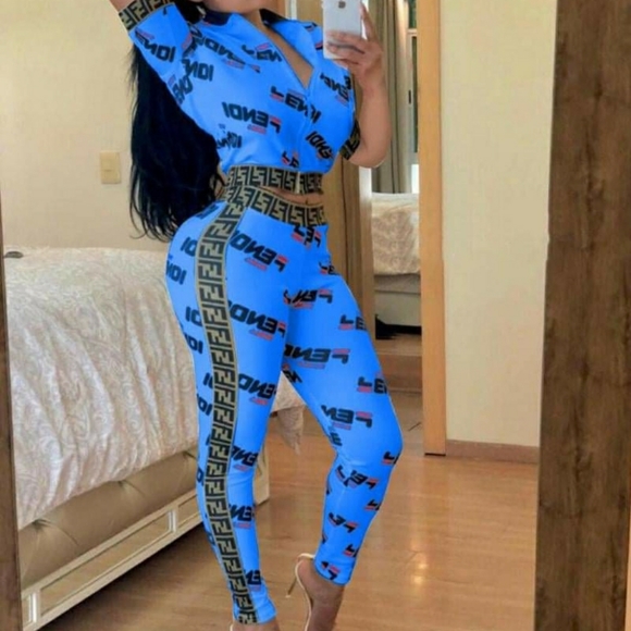 Fashion Nova Pants - Fashion Nova Blue Logo Print Jumpsuit with Brown Trim
